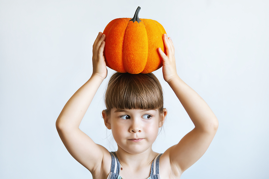 bigstock-A-Cute-Little-Girl-Is-Holding-461062023.jpg thumbnail image of blog post healthy dental tips for the spooky season!