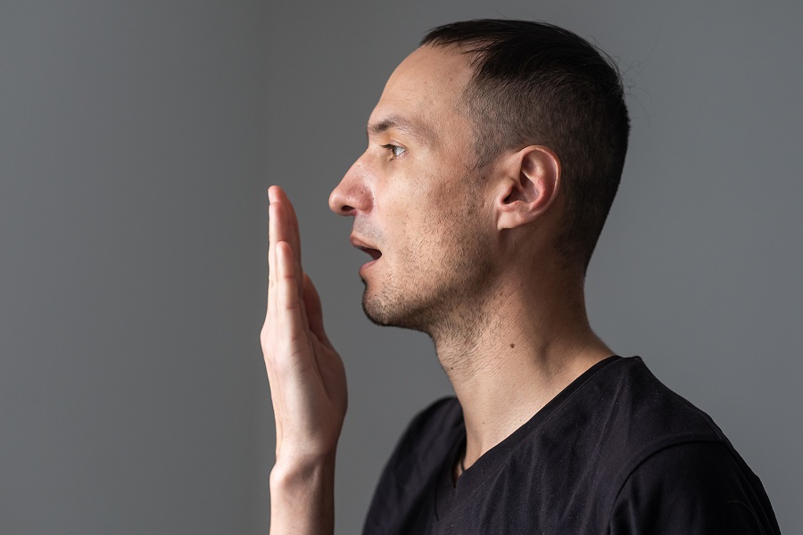 bigstock-Close-Up-Of-A-Good-looking-Man-449553555.jpg thumbnail image of blog post overcome your bad breath