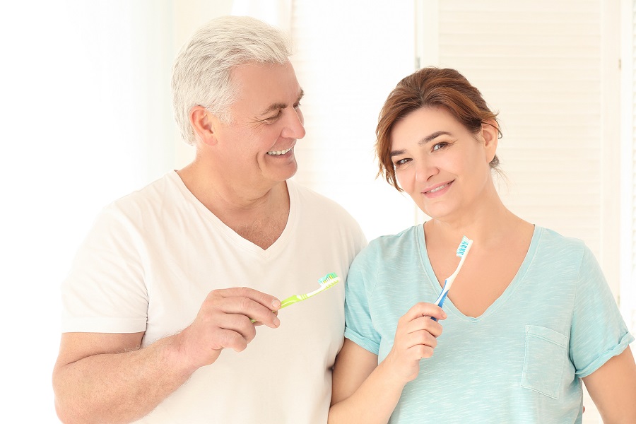 bigstock-Senior-couple-cleaning-teeth-a-189084619.jpg thumbnail image of blog post oral health advantages: aging and dental health