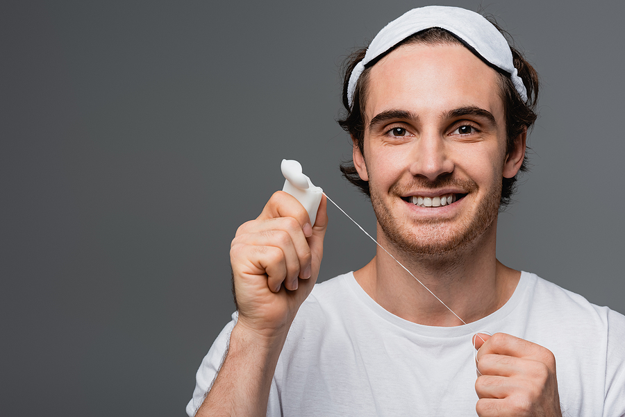 bigstock-Smiling-Man-In-Sleep-Mask-Hold-437064290.jpg thumbnail image of blog post good oral health starts in the home and continues with great dental care