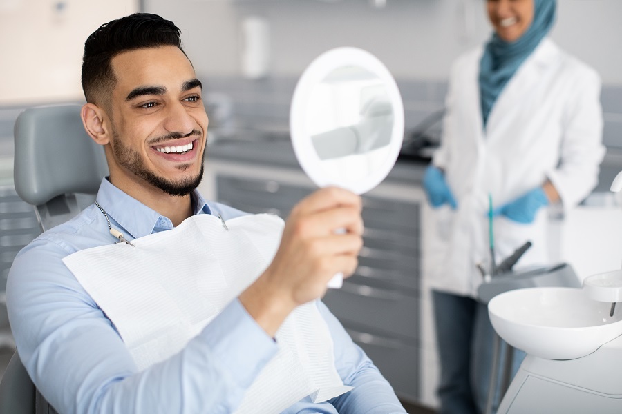 shutterstock_2068648295.jpg thumbnail image of blog post dental implants are a solution to replacing lost teeth